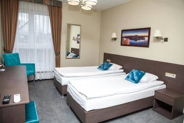 Фото номера Двухместный номер с 2 отдельными кроватями Отель Hotel Sokołowska Airport Modlin г. Новы-Двур-Мазовецки 7